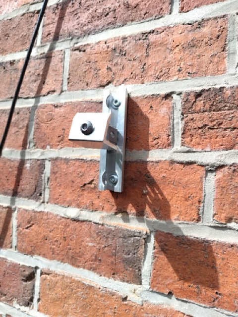 Renusol Metasole+ and End Clamp Installed on Brick