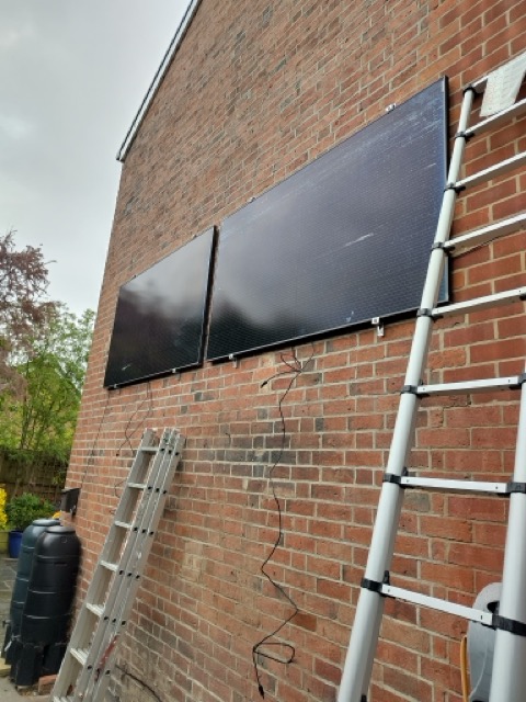 2 panels mounted on wall