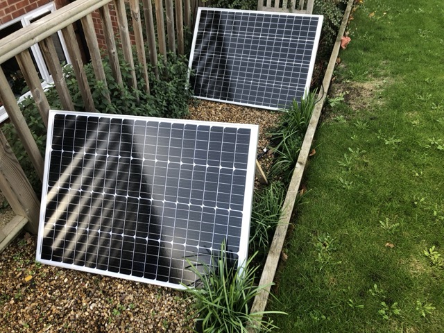 2 panels propped up by pieces of wood