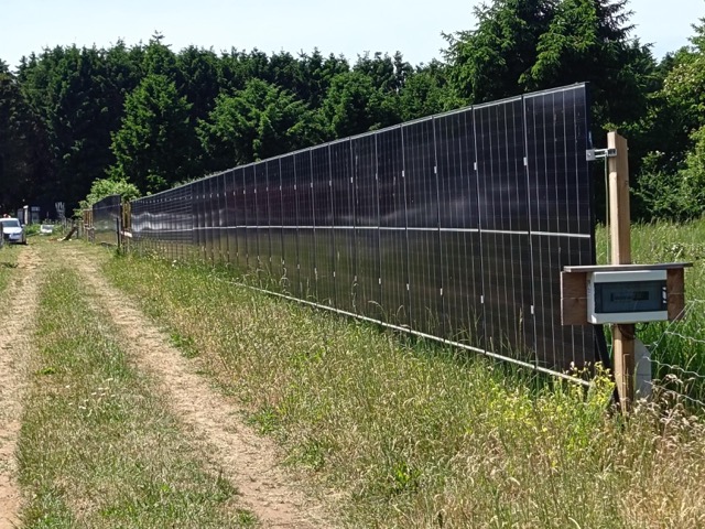 A large array of panels creating a fence