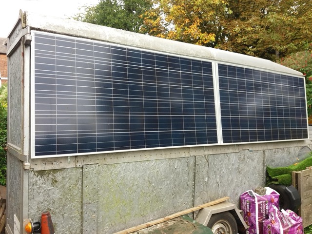 2 panels attached to a static trailer